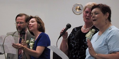Peter, Barbara, Dorothy Ann, and Surya sang <i>The Rose</i>.