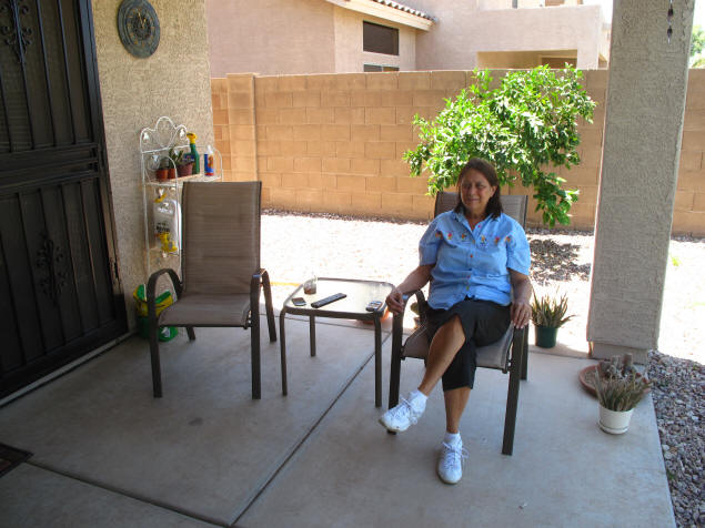 Mary enjoying the porch.