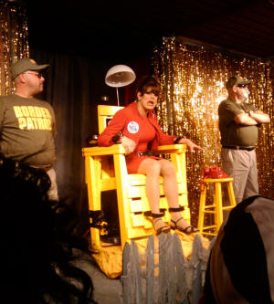 Celia Putty as Sarah Palin awaiting reprieve.