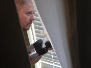 Jason saws away at the recalcitrant box spring.