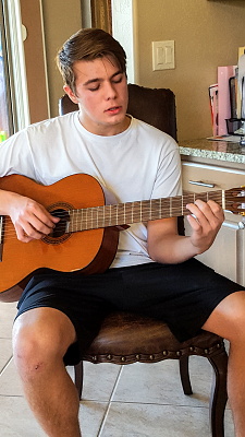 Zach on the guitar