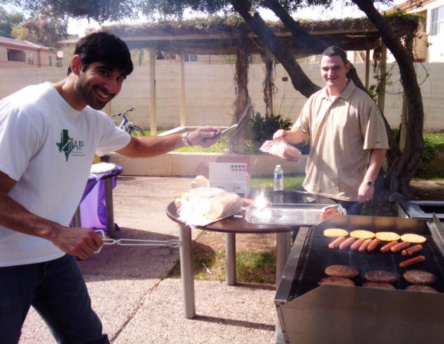 Saman Rezaie grills lunch.