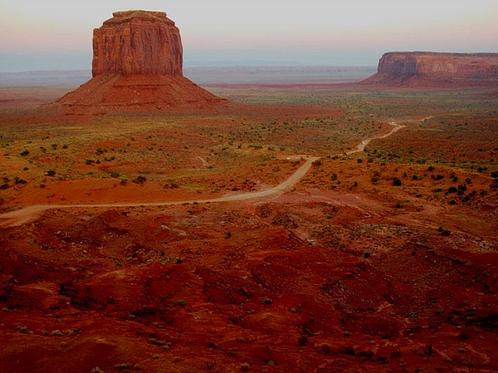 The unpaved road through the monuments of Monument Valley.