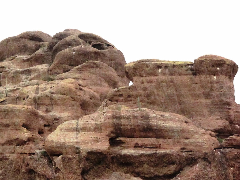 Daylight peaks through the sandstone.