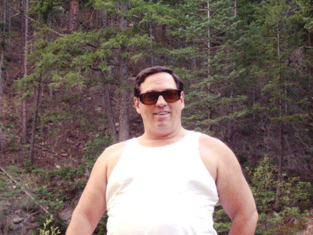 Michael looks happy in the wilderness.