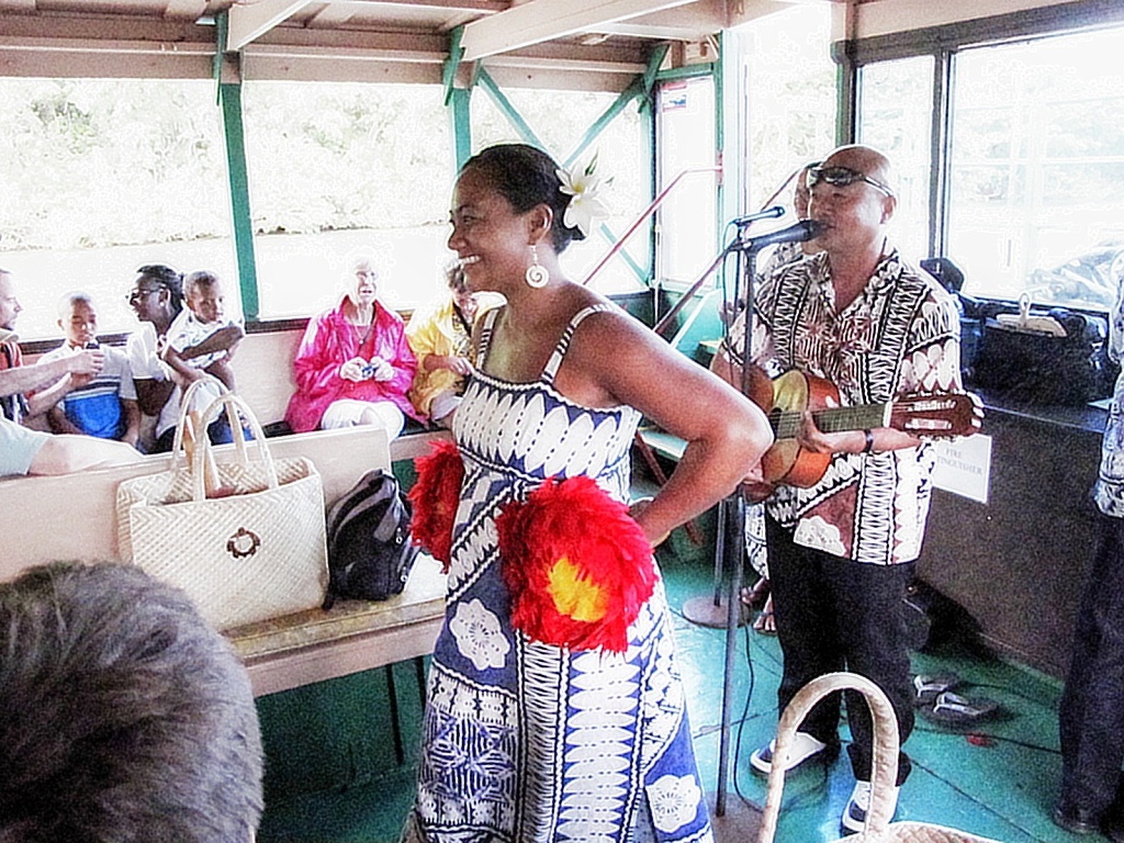 Hawaiian music and hula girls on the river tour.