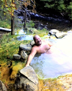 Me relaxing in the uppermost of three connected pools.