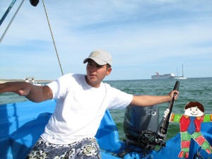 Flat Stanley helps steer the boat.