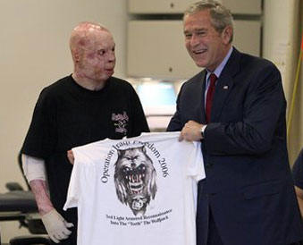 Lance Cpl. Isaac Gallegos gets a t-shirt.